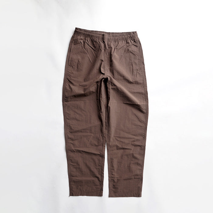 MADE WARM UP NYLON PANTS