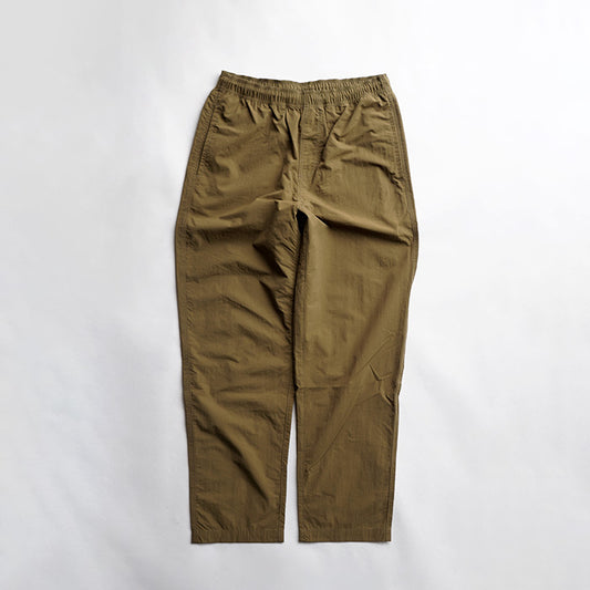 MADE WARM UP NYLON PANTS